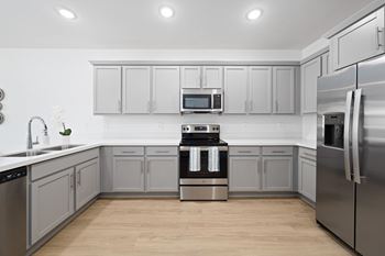 Gourmet kitchen w/ stainless-steel appliances